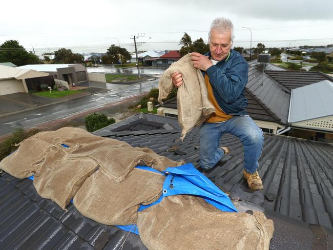 Bill Alexopoulos lost part of the roof of his Aldinga Beach home. Picture: Tait Schmaal