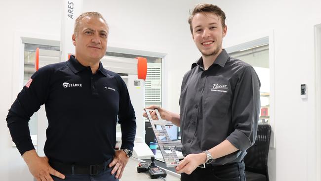 Stärke Advanced Manufacturing Group chief executive Al Jawhari with intern Michael Eason at the Precise Machining and Manufacturing facility in Edwardstown. Picture: Grant Law