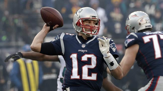 FILE - In this  Sunday, Jan. 21, 2018 file photo, New England Patriots quarterback Tom Brady throws a pass during the first half of the AFC championship NFL football game against the Jacksonville Jaguars in Foxborough, Mass. For the third time, Tom Brady is the NFL's Most Valuable Player. Brady added The Associated Press 2017 NFL MVP award Saturday night, Feb. 3, 2018 at NFL Honors to his wins in 2007 and 2010. (AP Photo/David J. Phillip, File)