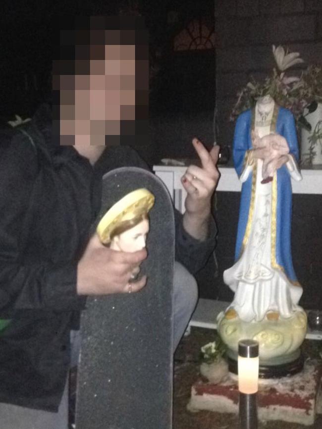 A man holding a beheaded statue at Dulwich Hill Catholic Church. (Pic: supplied)