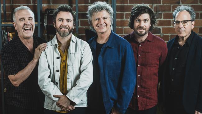 ***EXCLUSIVE FOR THE AUSTRALIAN*** Australian rock band Crowded House, whose seventh  album 'Dreamers Are Waiting' was released in 2021. L-R: Nick Seymour (bass), Liam Finn (guitar), Neil Finn (guitar/vocals), Elroy Finn (drums) and Mitchell Froom (keys). Picture: Stephen Dykes