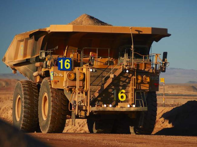 BHP Billiton's new robot trucks that are set to run on its Jimblebar mine in the Pilbara next year. Supplied. No restrictions