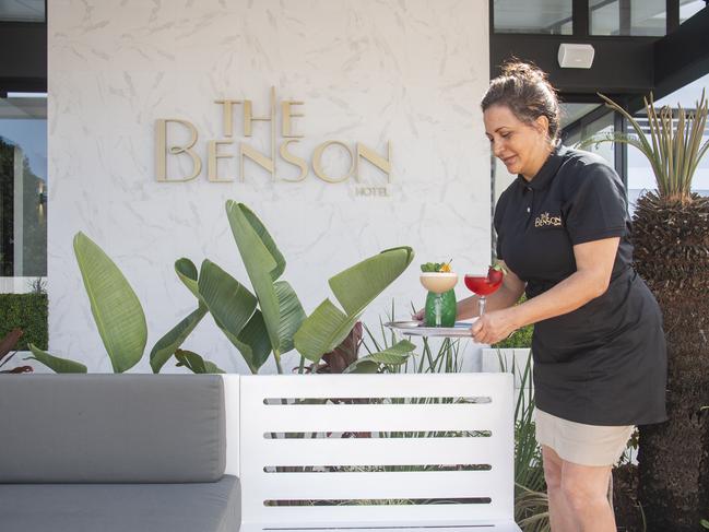 Sibere Rodrigues delivers cocktails at The Benson hotel restaurant in Cairns.