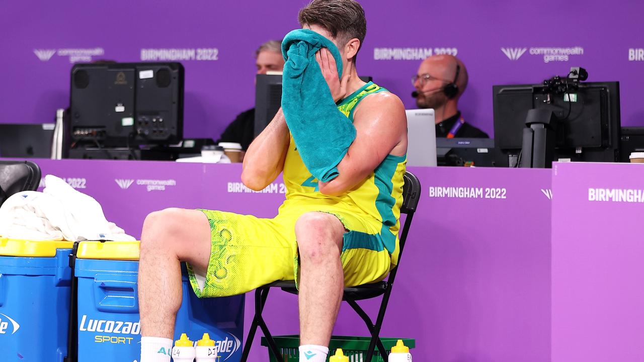 A shattered Greg Hire on the Aussie bench.