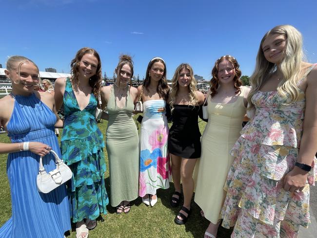 Jolie Brown, Lexi Voss, Ruby Pantisano, Emma Carr, Aiyana Araniev, Ruth Burrows and Grace Hasler at the 2024 Oaks Day. Picture: Himangi Singh.