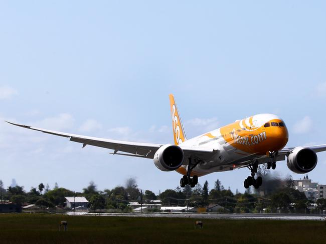 The new Scoot Dreamliner aircraft pictured touching down at Gold Coast Airport for the first time on its way to Singapore Pic by David Clark