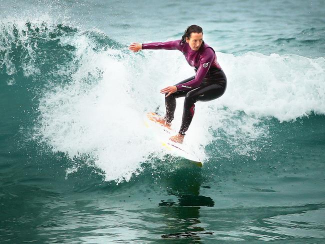 Surfing legend Layne Beachley, pictured here at Freshwater Beach, continued to surf at Queenscliff this morning. Picture: Troy Snook