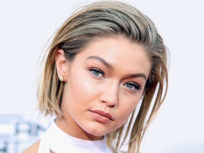 Fake chop ... Gigi Hadid turned heads at the American Music Awards last month with her short hair — only to reveal her long hair was actually pinned underneath. Picture: Getty Images