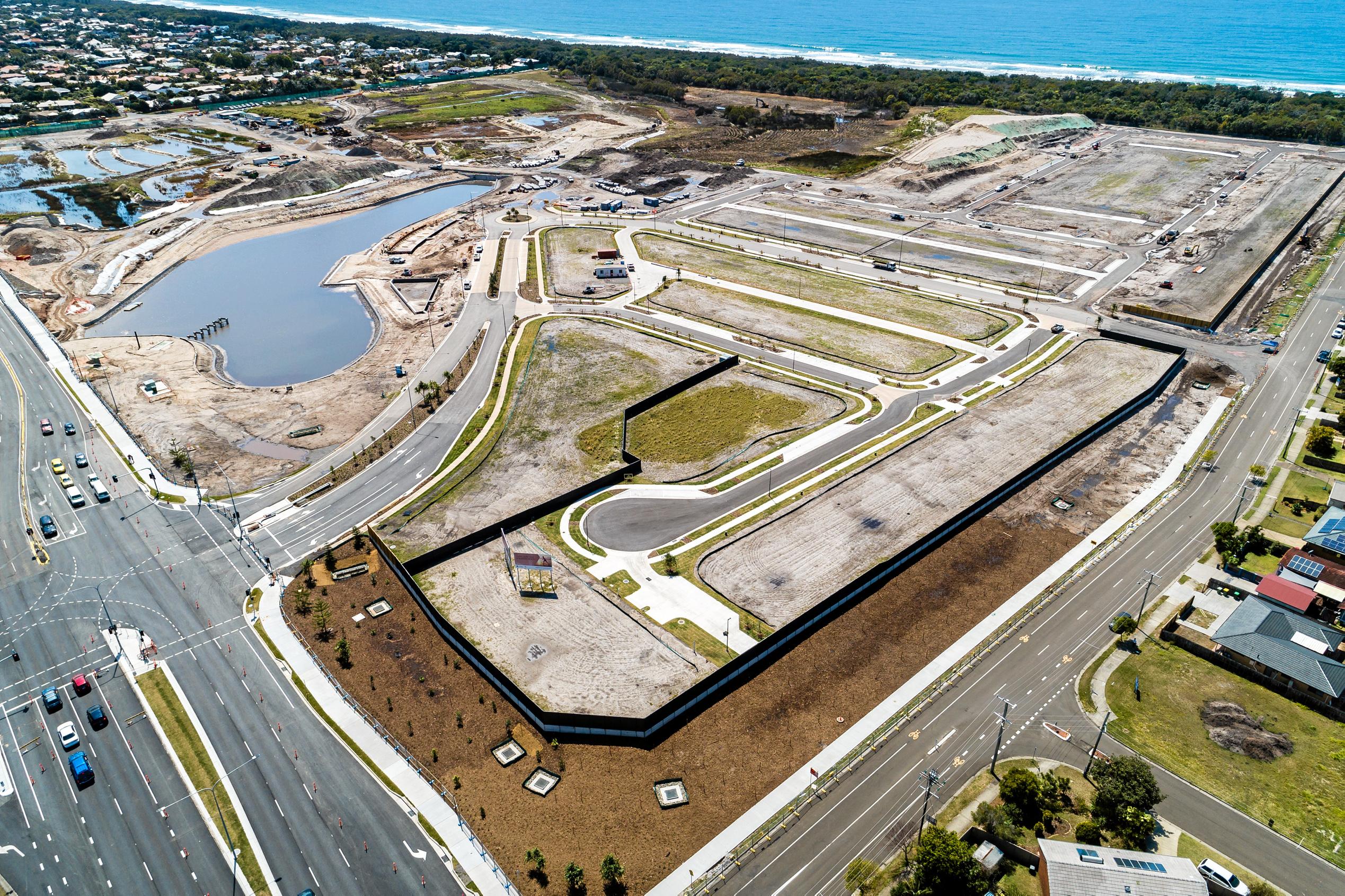 A number of milestones are within reach at Stockland's Oceanside development in Birtinya. Pictured are recent aerial photographs showing housing site and lake development in the Bokarina Beach residential area. Picture: Stockland