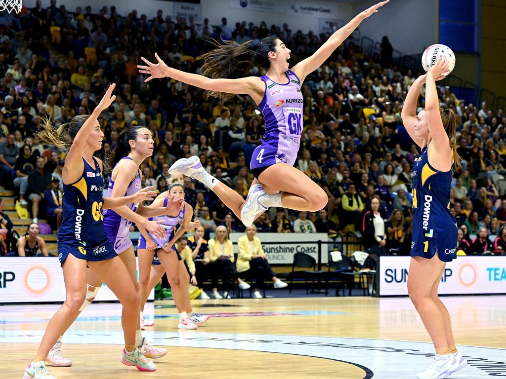 Steph Wood of the Lightning shoots as Remi Kamo of the Firebirds defends her shot. (Photo by Bradley Kanaris/Getty Images)