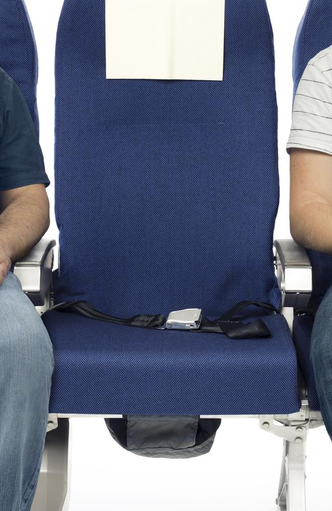 If you think booking the middle seat on a plane will get you a free upgrade, think again. Picture: iStock