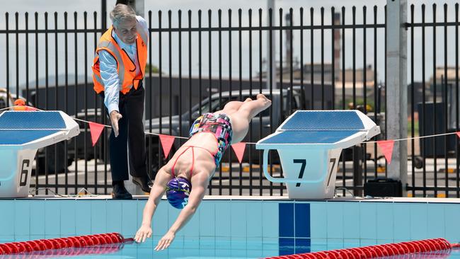 Mayor Greg Williamson gives 14-year-old Bayley Sleeman the all-clear to take the first dive into the 50m pool at the Mackay Aquatic and Recreation Complex, which is expected to open in March.