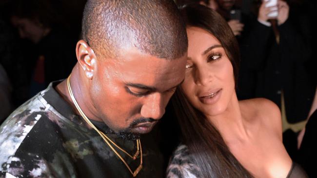 Kanye West and Kim Kardashian are pictured in happier times. Picture: Alain Jocard