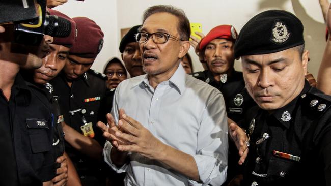 Anwar Ibrahim leaves court earlier this month.