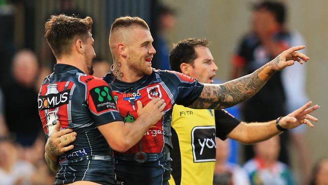 Josh Dugan celebrates a try for the Dragons. Picture: Mark Evans