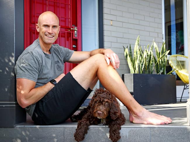 -FOR SUNDAY MAIL SA - NOVA radio host Ryan 'Fitzy' Fitzgerald pictured at his home in Balmain with spoodle dog Beastie. For Mental Health campaign launch. Picture: Toby Zerna