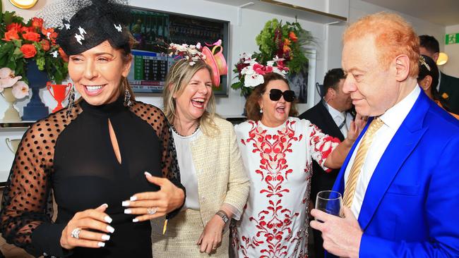 Heloise Pratt, HWT chairman Penny Fowler with Hancock prospecting chairman Gina Rinehart and VISY chairman Anthony Pratt in the HWT marquee during the Melbourne Cup at Flemington racecourse. Picture: Aaron Francis