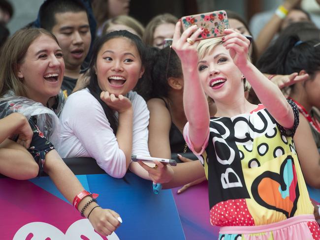 Carly Rae Jepsen poses with the delighted crowd. Picture: Nathan Denette/The Canadian Press via AP