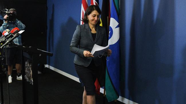 Gladys Berejiklian walks away after completing her final media conference as NSW Premier. Picture: Bianca De Marchi - Getty Images