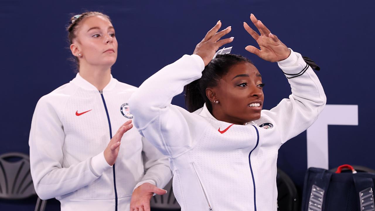 Grace McCallum and Simone Biles react during the Women's Team Final. Picture: Laurence Griffiths/Getty Images