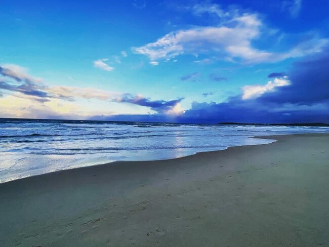 Cyndi Zoranovic with a shot of Corindi Beach. Coffs cover image.