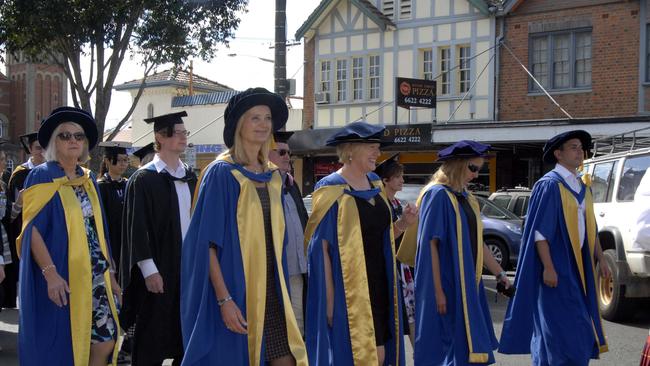 SCU GRADUATION In 2015 a street procession of Southern Cross University students walked through Lismore ahead of their graduation ceremony.