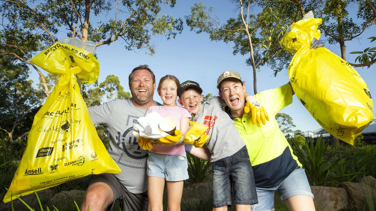 Clean Up Australia Day is a good way for families to volunteer together, like Liz and Tony Mercer and their children, Abigail, 6, and Lachlan, 9, from Brookhaven in Queensland. Picture: Renae Droop/RDW Photography