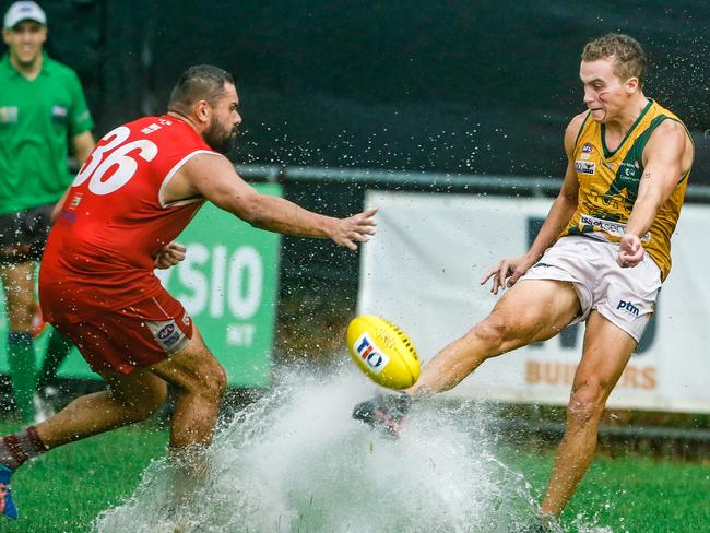 St Mary's Shaun Edwards kicks the ball away against Waratah. Picture: Glenn Campbell