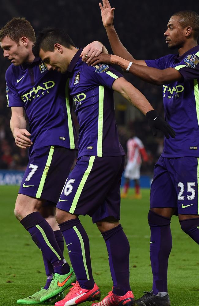 Manchester City's Argentinian striker Sergio Aguero (2nd L) celebrates.