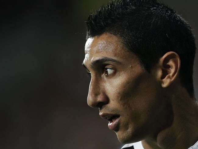 Real Madrid's Angel Di Maria from Argentina reacts during a Spanish Super Cup soccer match against Atletico Madrid at Santiago Bernabeu stadium in Madrid, Spain, Tuesday, Aug. 19, 2014 . (AP Photo/Daniel Ochoa de Olza)