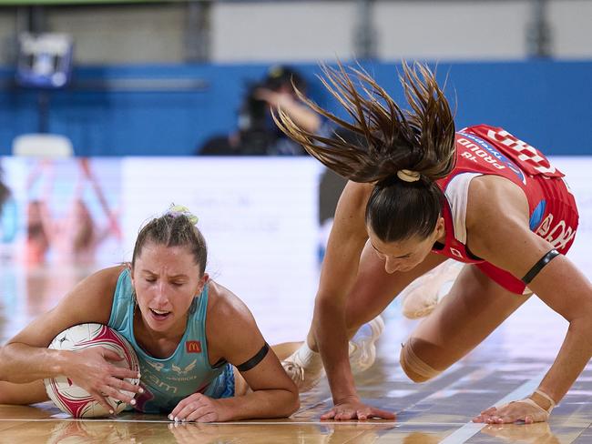 SYDNEY, AUSTRALIA - APRIL 21: Maddy Proud of the Swifts and Amy Parmenter of the Mavericks collide during the round two Super Netball match between NSW Swifts and Melbourne Mavericks at Ken Rosewall Arena, on April 21, 2024, in Sydney, Australia. (Photo by Brett Hemmings/Getty Images)