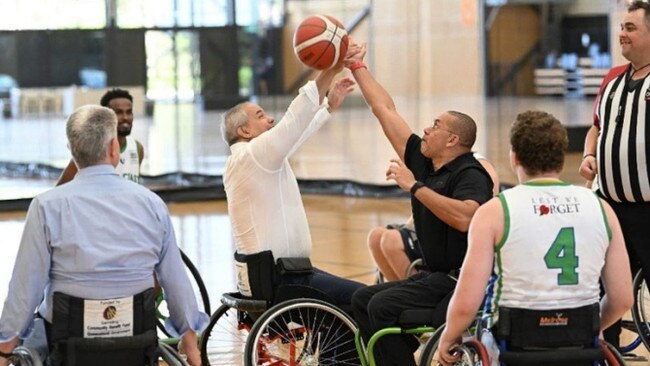 Gold Coast Mayor Tom Tate with GC Rollerblaze during a visit by the Brisbane 2032 Organising Committee for the Olympic Games.