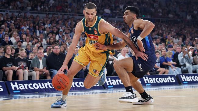 Jack McVeigh of the JackJumpers drives to the basket under pressure from Shea Ili of United during game five of the NBL Championship Grand Final Series. Photo by Daniel Pockett/Getty Images