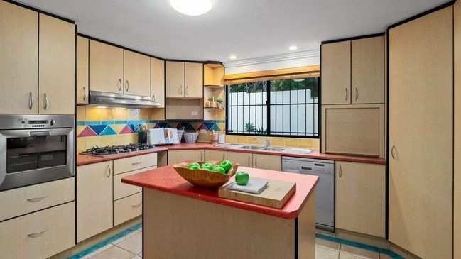 The kitchen of a five-bedroom house in Brisbane’s south that the family inspected along with dozens of other people mid-week – which is on the lower end of the rental pricing scale at $750 a week with bond of $3,000.