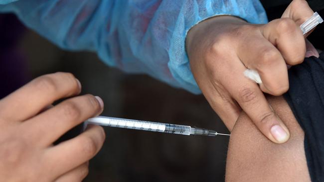 The Covid immunisation compensation scheme has been criticised for its limited scope and lengthy, complex processes. Picture: Aizar Raldes/AFP