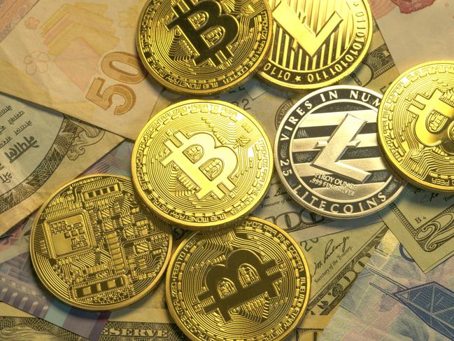 Beijing, China - December 29, 2017: Two months after the closure of Chinese exchanges, Bitcoin price broke $11000 in December 2, 2017, and some new forks of Bitcoin were launched: Bitcoin Cash (BCH), Btcoin Gold (BTG), Bitcoin Diamond (BCD). Photos of cryptocyrrencies Bitcoin, Litecoin, Ethereum, dogecoin with trditional money, new currency system, full  depth of focus istock image