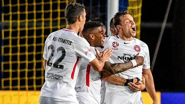 Brendon Santalab celebrates Alvaro Cejudo’s goal against the Mariners