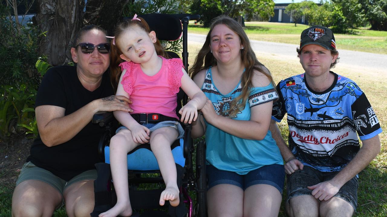 Jo Costin, who is Elora’s grandmother, mother Alisa Jakavicius and father Liam Bremen with Elora Bremen outside the family home in Ingham. Picture: Cameron Bates