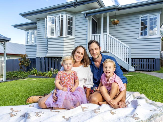 Carly and Carly Gardiner with two-year-old Maggie and three-year-old Laurie, at their Kedron home, Saturday, March 19, 2022 - Picture: Richard Walker