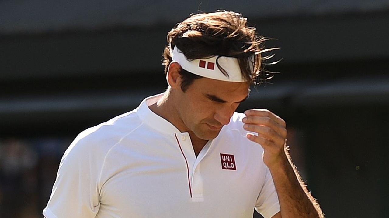 Switzerland's Roger Federer reacts after losing a point against South Africa's Kevin Anderson.