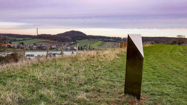 A mysterious metal monolith, similar to others appearing in Europe and USA, also appeared in Belgium. Picture: Bruno Fahy / Belga / AFP