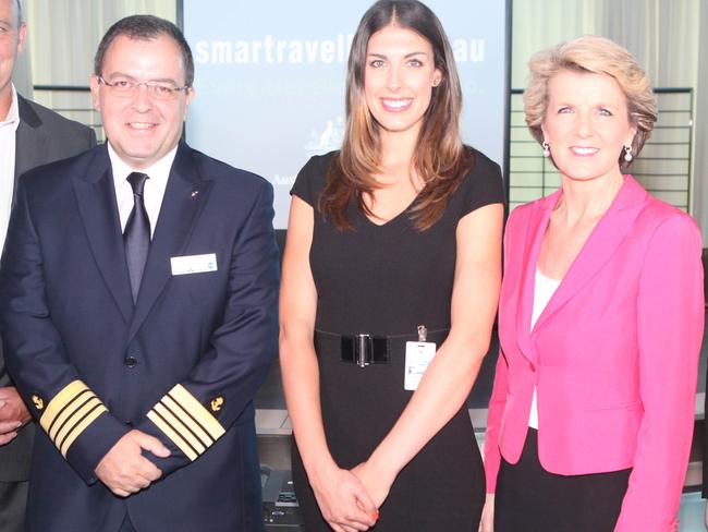 Captain Yannis Berdos with travel insurance advocate Natalie Hensby and Foreign Affairs Minister Julie Bishop at the 2013 launch of the Smartraveller advertising campaign. Picture: Jason McCormack