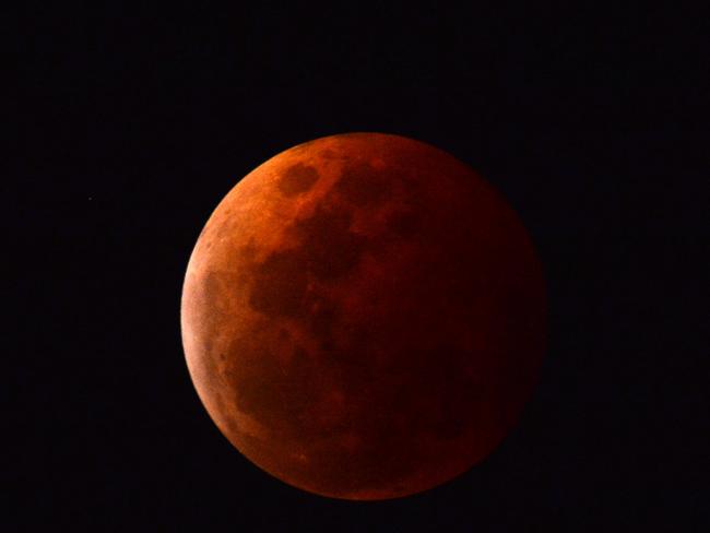 Tonight marks one of the most spectacular astronomical events of the year, a total lunar eclipse with a blood red moon. Picture: Evan Morgan