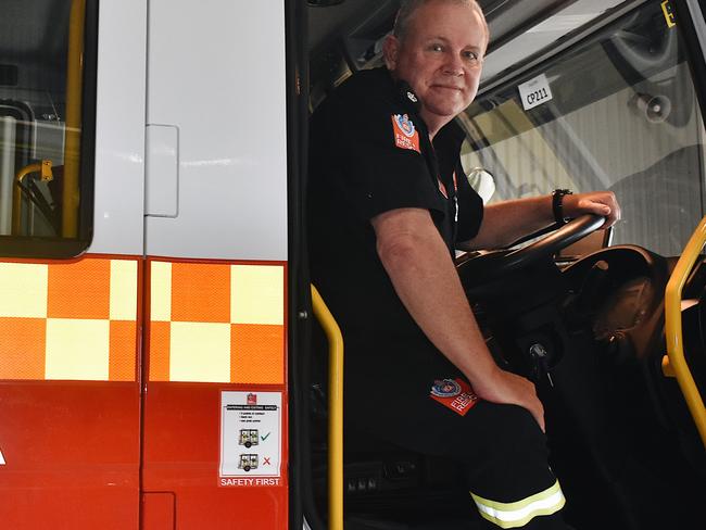 Brad Harrison hangs his gear up for the last time at Ballina Fire Station after 43 years as a firefighter. Picture: Tessa Flemming