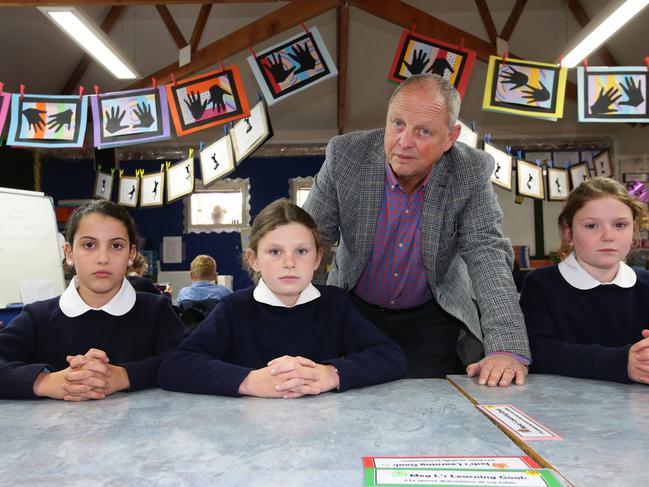 St Roberts, year 4 students Monteya Criscione, Charlotte DeGrandi and Meg Lappin with principal Mark Soldani. Catholic schools fear they could lose money under new Gonski 2.0 funding. Picture: Peter Ristevski