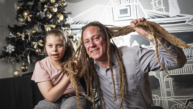 Joel Anderson with his daughter Charlise before Joel's dreadlocks are cut off in a fundraiser for Charlise at the Blue Mountain Hotel, Saturday, November 23, 2024. Picture: Kevin Farmer