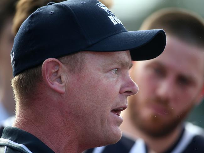 Phil Plunkett coach of Bundoora addresses his players during the NFL footy match between Bundoora and Whittlesea played at Yulong Reserve in Bundoora on Saturday 7th May, 2016. Picture: Mark Dadswell