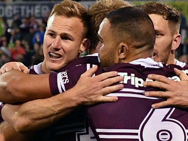 Manly Sea Eagles players celebrate victory during the Round 23 NRL match between the Canberra Raiders and the Manly Sea Eagles at GIO Stadium in Canberra, Sunday, August 25, 2019. (AAP Image/Joel Carrett) NO ARCHIVING, EDITORIAL USE ONLY