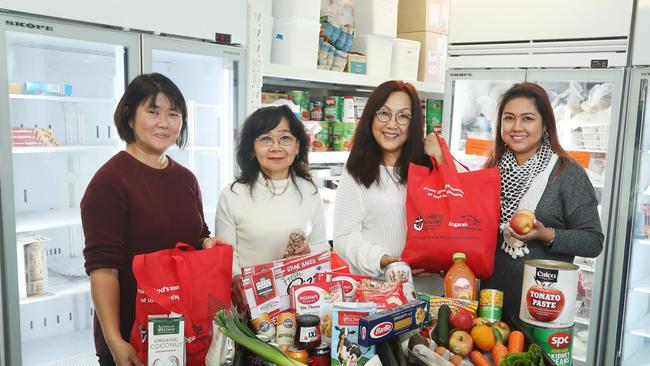 Millin Goodman, Rita Rachamp, Lala Noronha and Laura Bouzidi with a selection of donated goods.