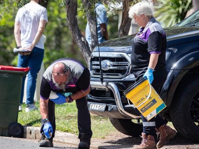 Forensic cleaners outside the Toongabbie home on Saturday. Picture: Julian Andrews